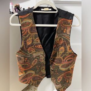 Vintage orange colored vest